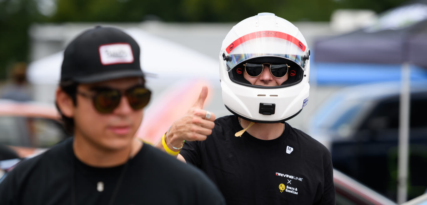 First slide, guy giving a thumbs up in a helmet