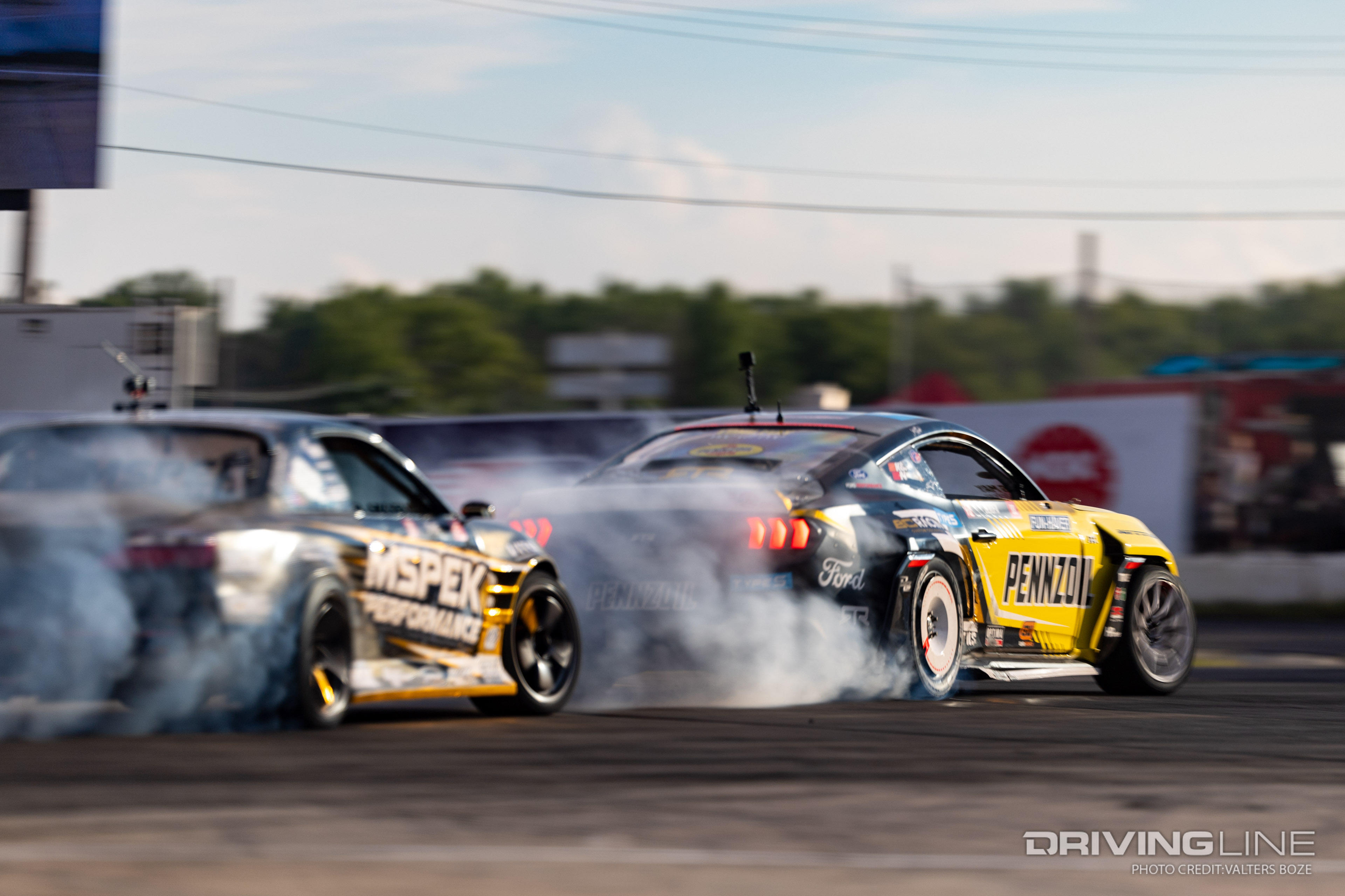 Stuke tandem drifting against Chelsea DeNofa at 2023 Formula Drift New Jersey Englishtown Raceway