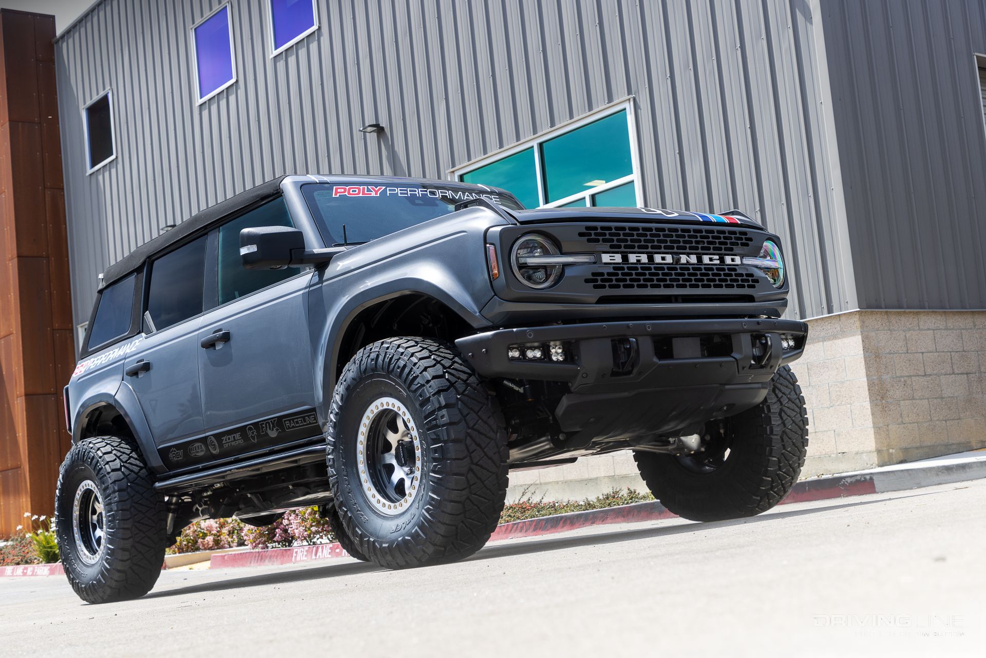 2021 Ford Bronco Badlands lifted on 37 inch Ridge Grappler tires front 3/4 view