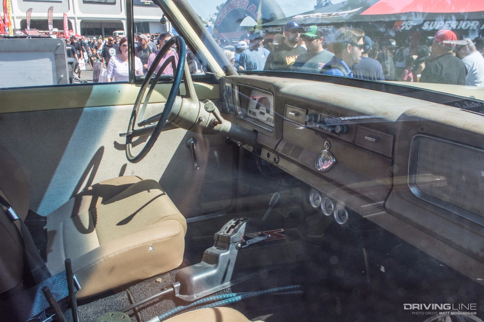 The Wagoneer's interior is mostly stock with a roll cage