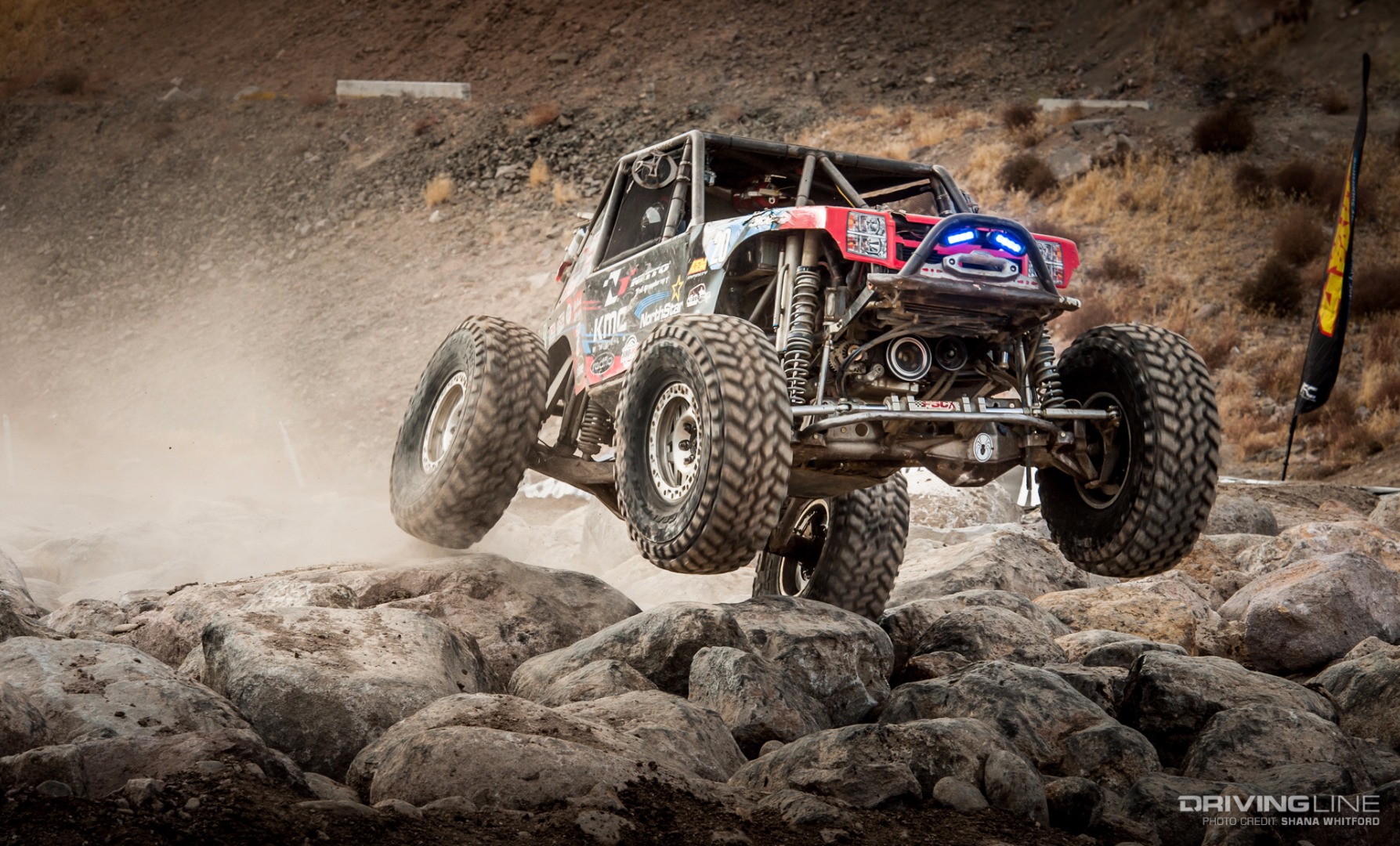 Derek West powering through the rocks