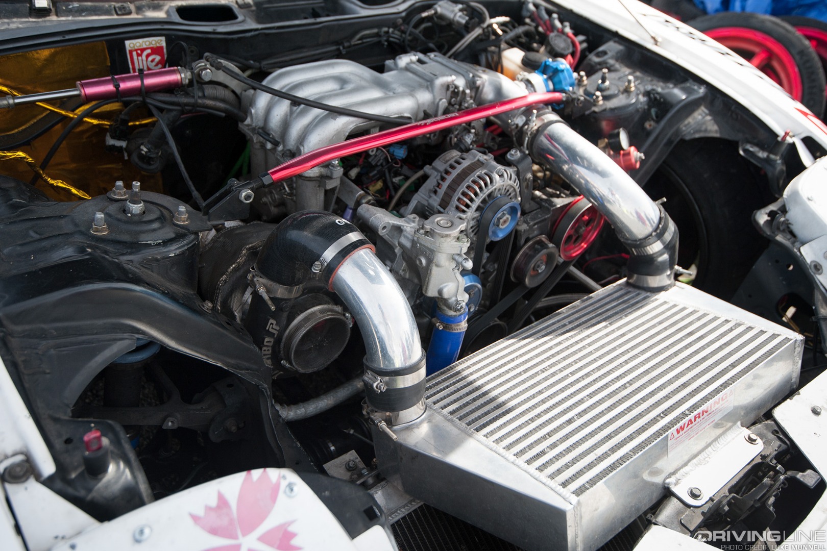 Top Drift round 1 SoCal pro-am drifting Daniel Kuo FD3S Mazda RX-7 single turbo 13B rotary engine bay V-mount