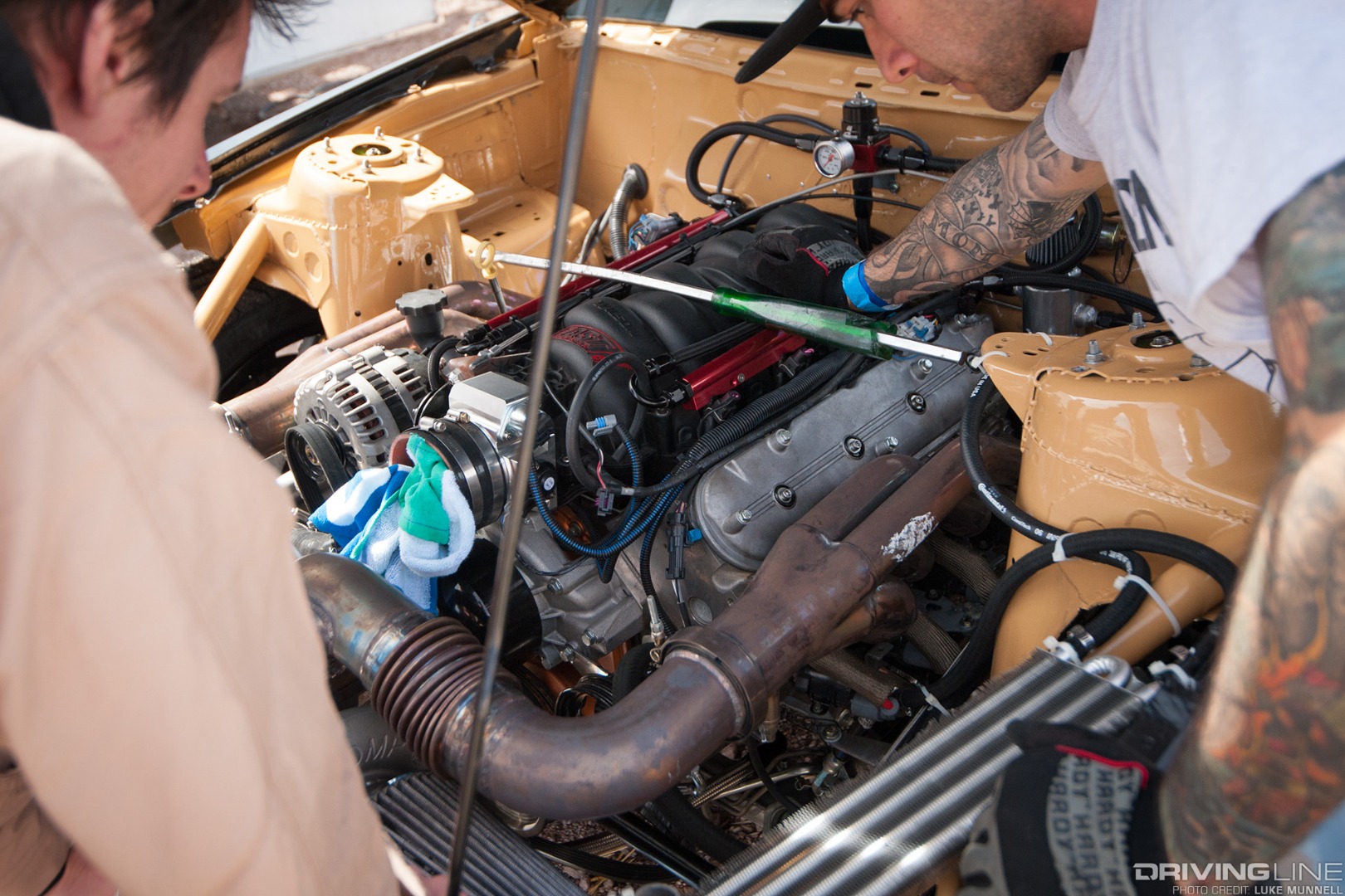 Top Drift round 1 SoCal pro-am drifting John Mason gray Ford Mustang GT drift car LS V8 engine bay