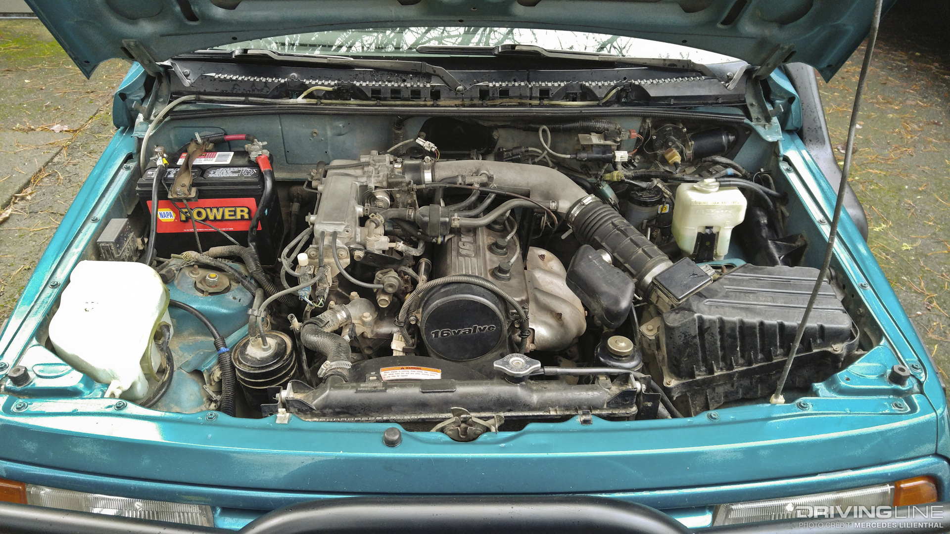Suzuki Sidekick engine bay