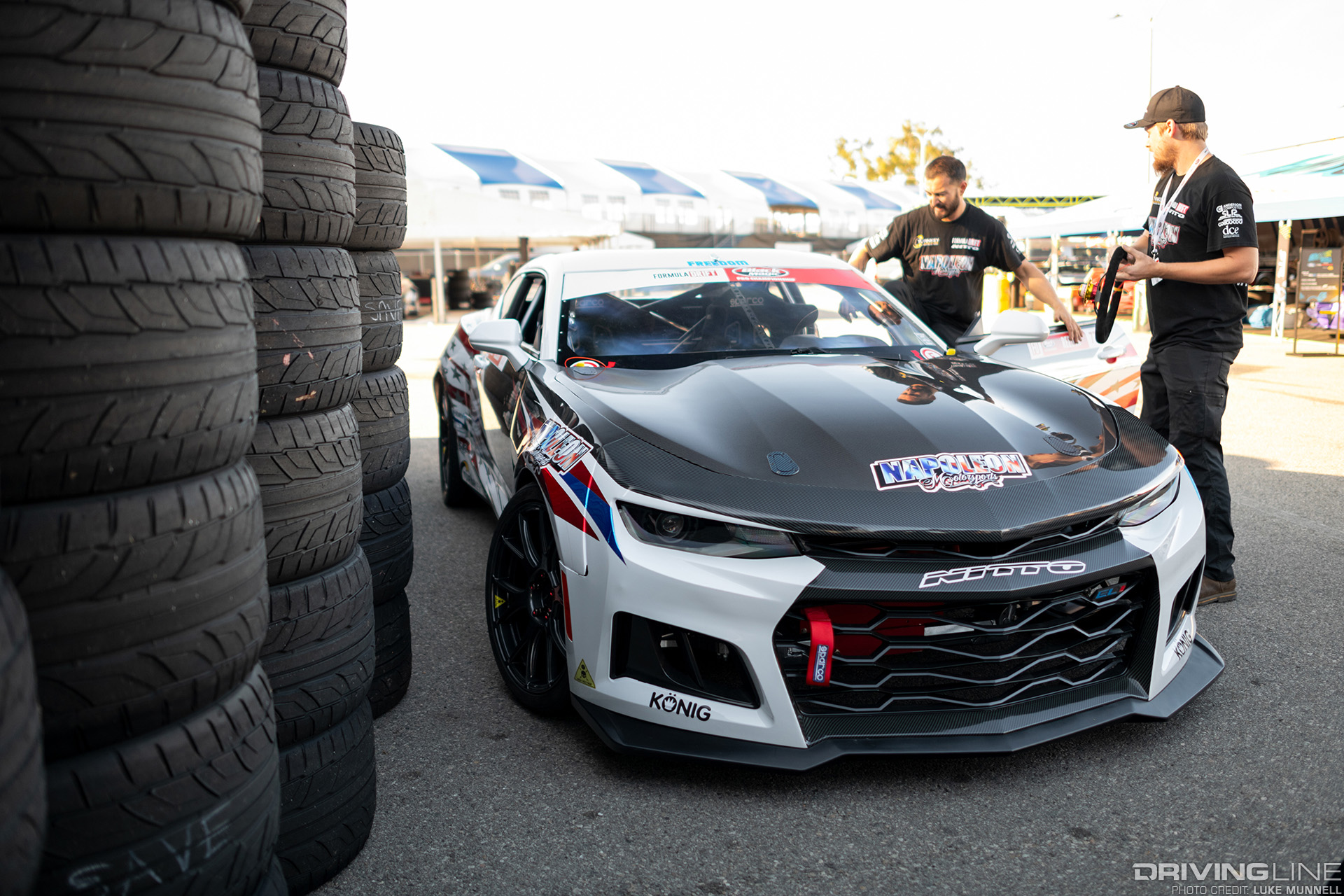 2019 Formula Drift Long Beach Travis Reeder Napoleon Racing Chevy Camaro EL1 next to tires