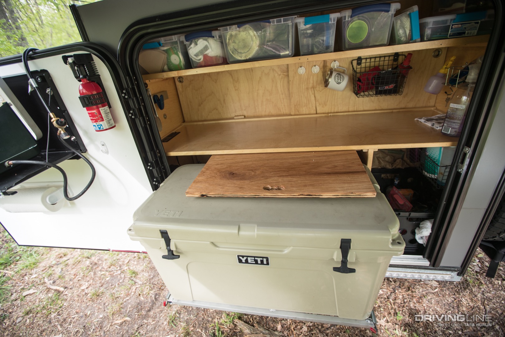 Yeti cooler storage in off-road camper trailer
