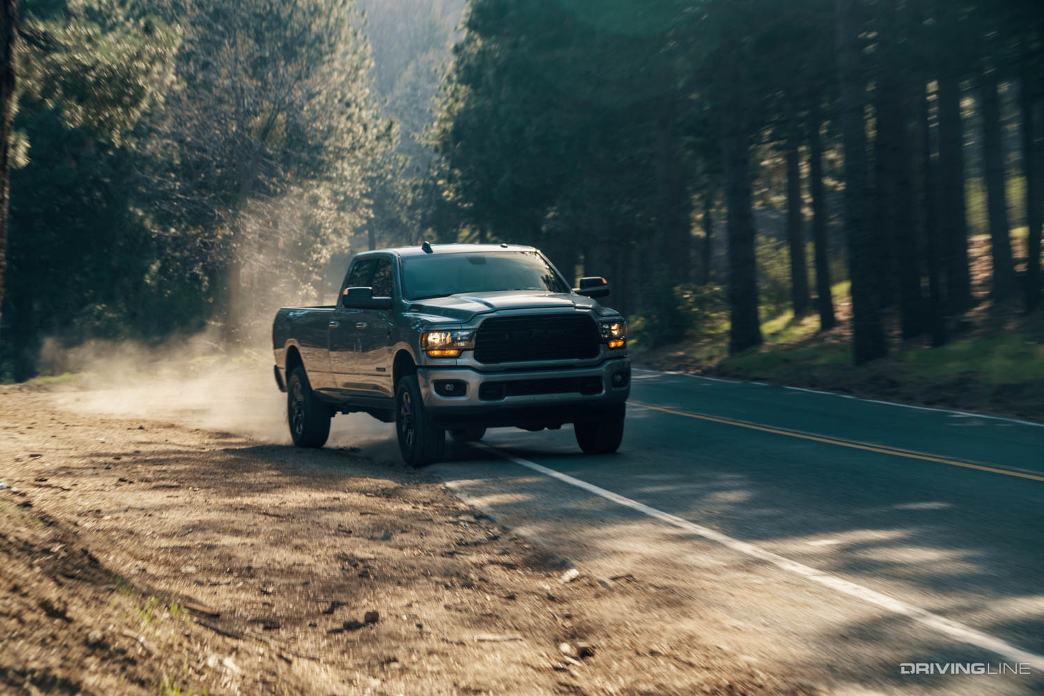 Nitto Recon Grappler A/T tire on RAM truck driving on dirt and street