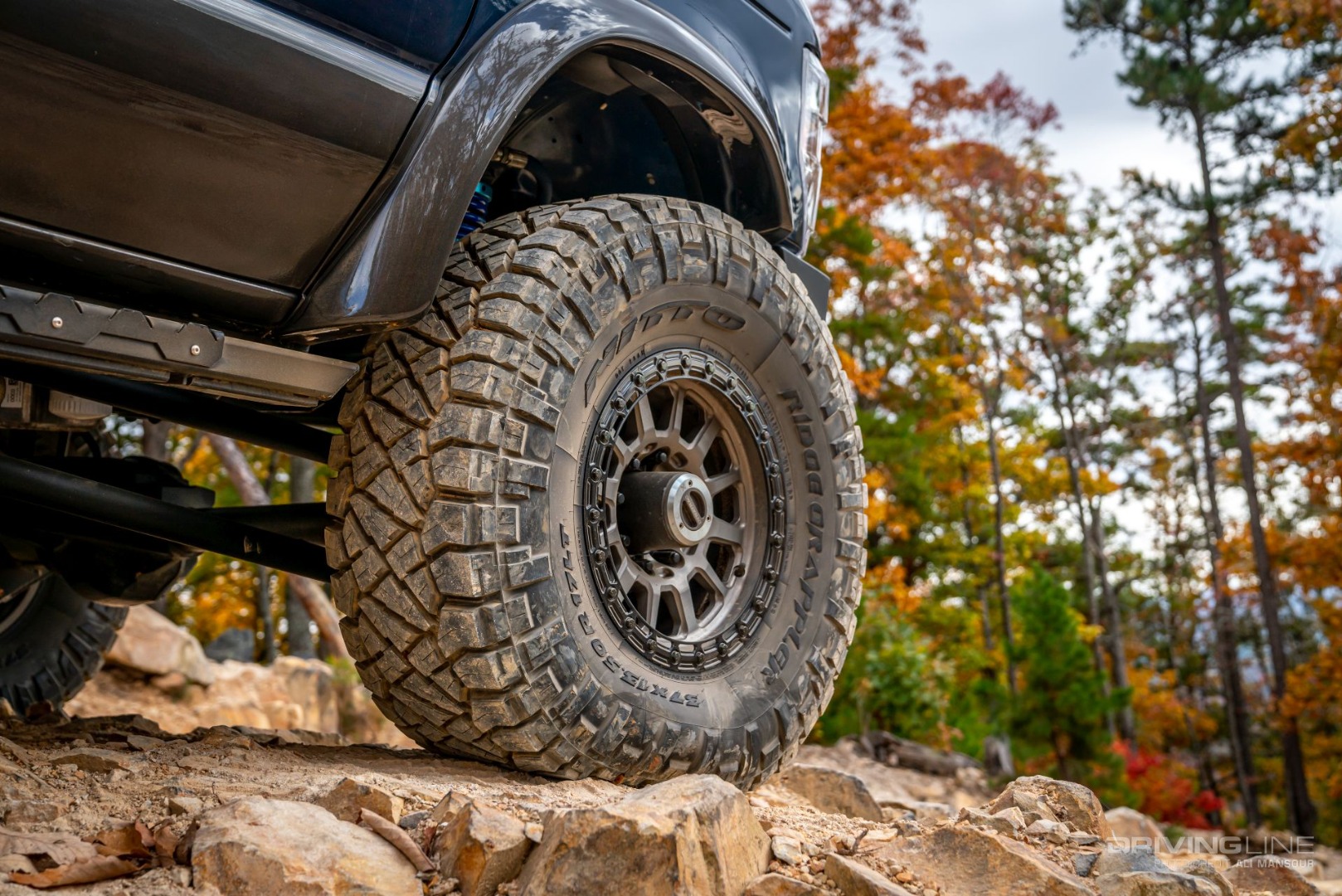 Nitto Ridge Grapplers on a 2021 Ford E350 4x4 flatbed cutaway van ujoint offroad