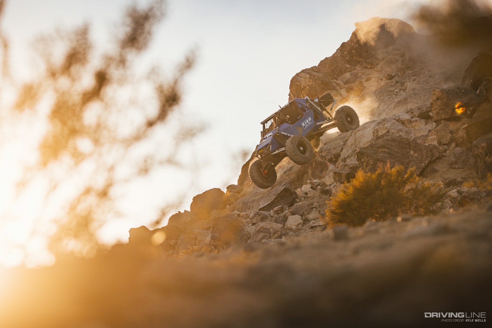 Raul Gomez driving down a steep rocky hill
