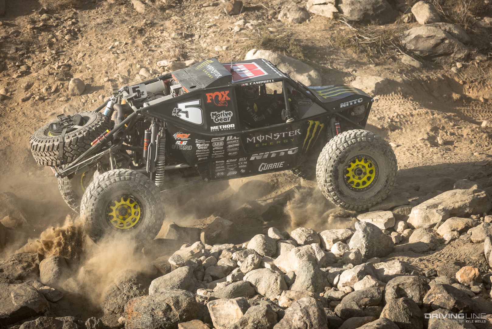 Shannon Campbell driving through a canyon