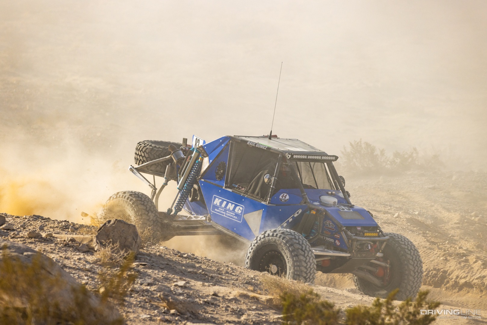 Raul Gomez driving through the desert