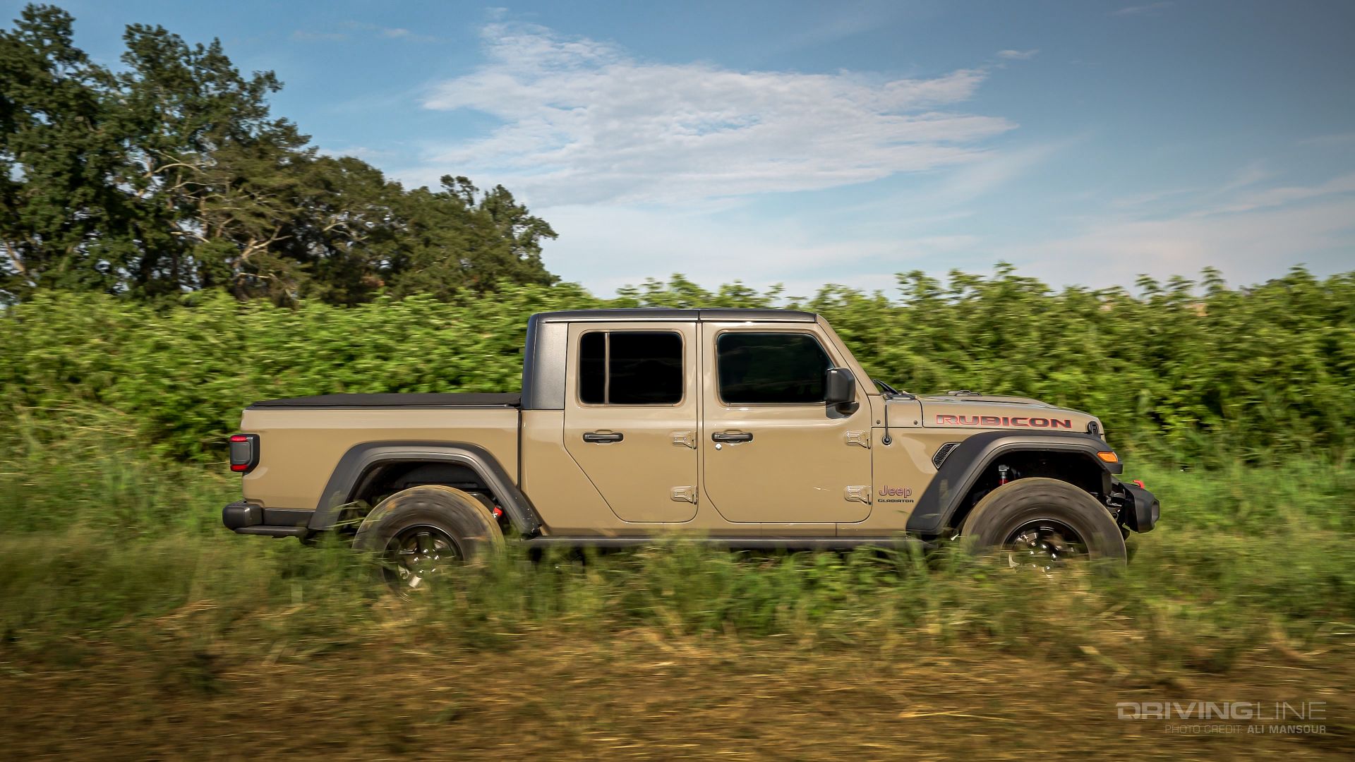 Jeep Gladiator Rubicon driving through east coast wilderness