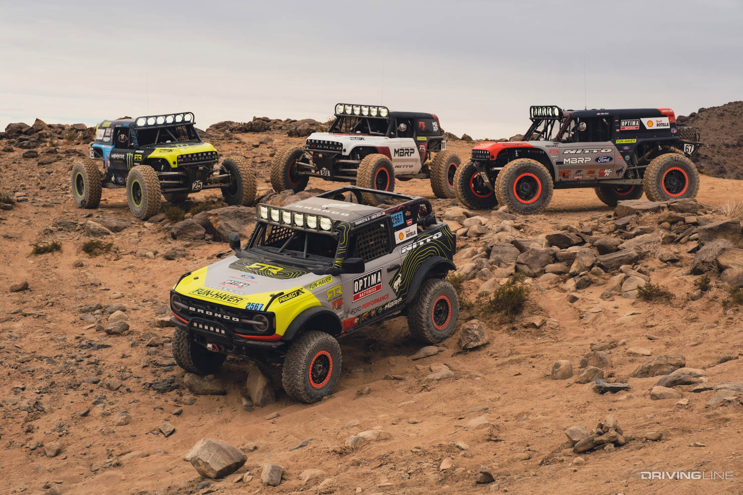 4600 class bronco in front of 4400 Unlimited class Off-Road race rigs