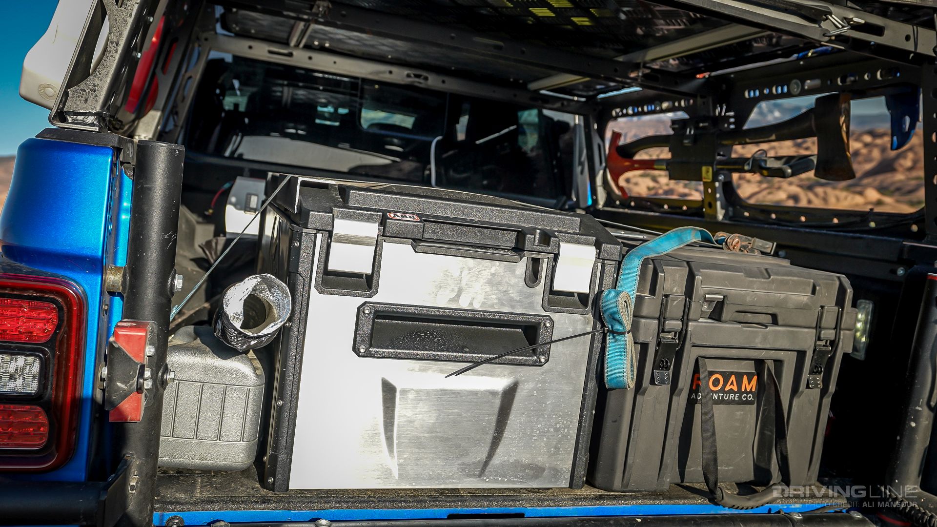 Jeep Gladiator Rubicon on 40s Overland Build gear inside the bed including an ARB refrigerator