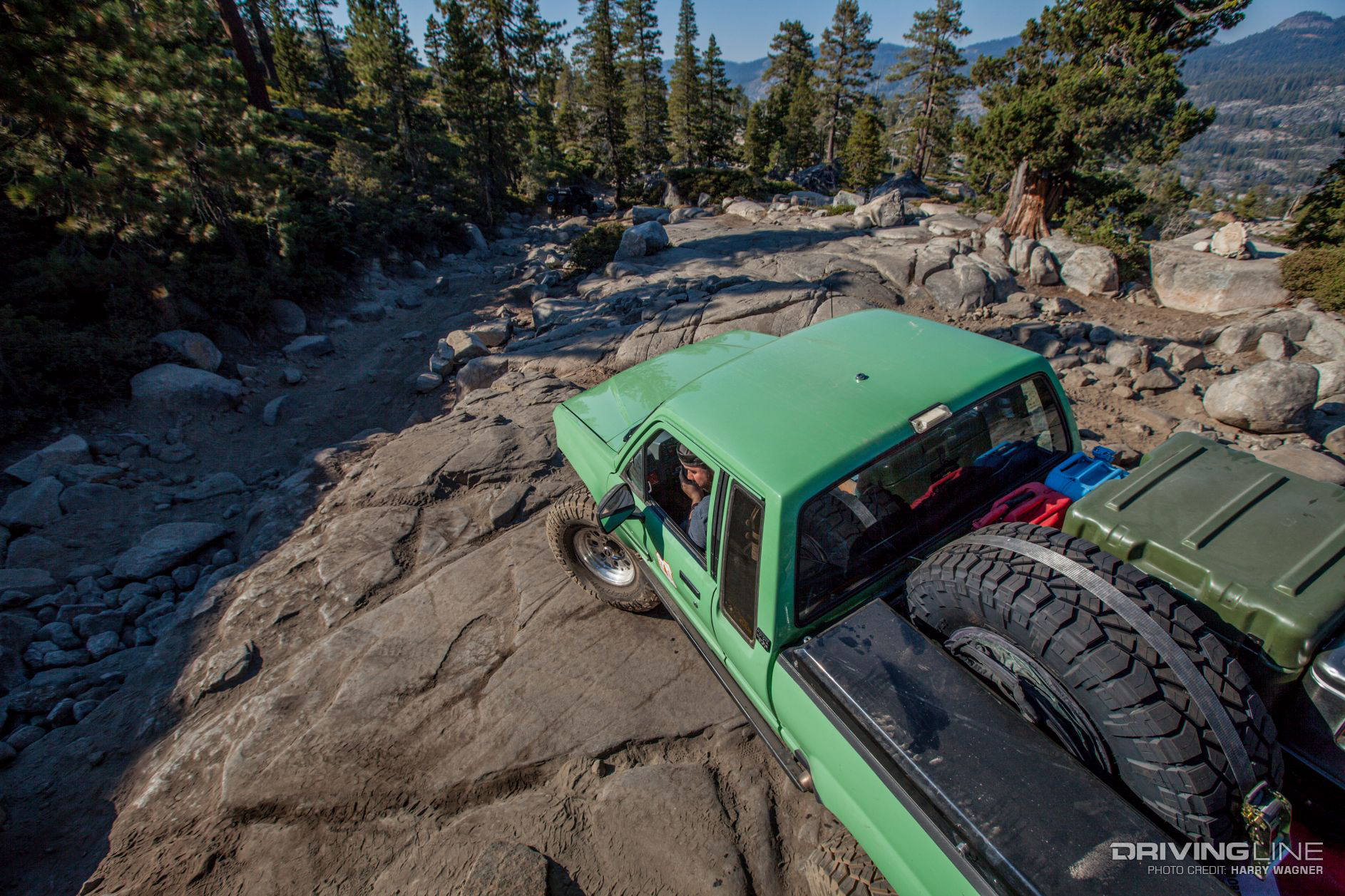 truck carrying fullsize 37-inch spare Ridge Grappler in bed