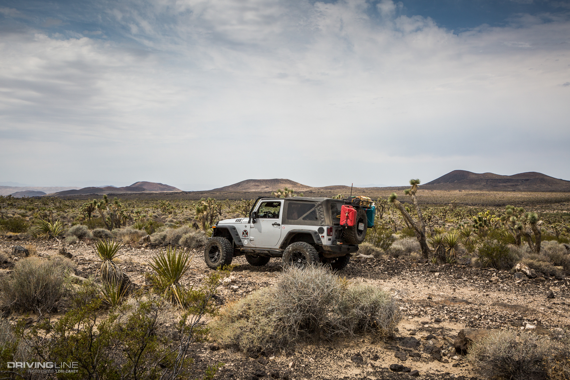 Jeep Wrangler and view of cinder cones from Aiken Mine Trail