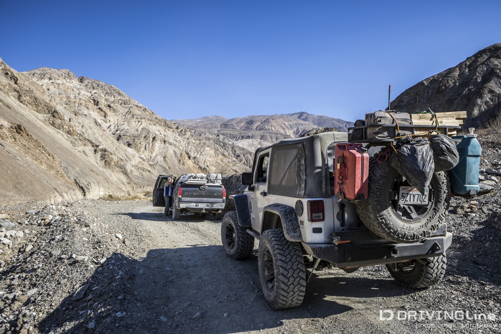 Jeep and Truck on Surprise Canyon Road
