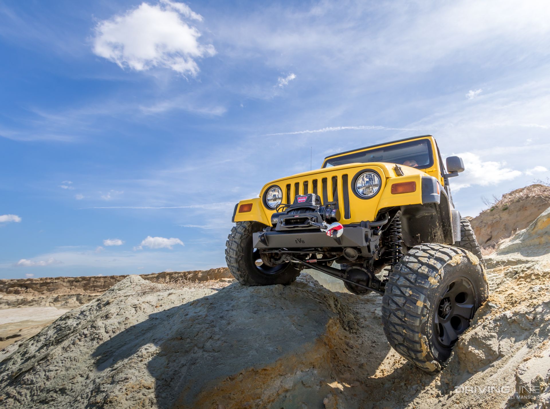 Jeep-wrangler-tj-evo-mfg-bumpers-warn-vr8-s-winch-mud-grapplers