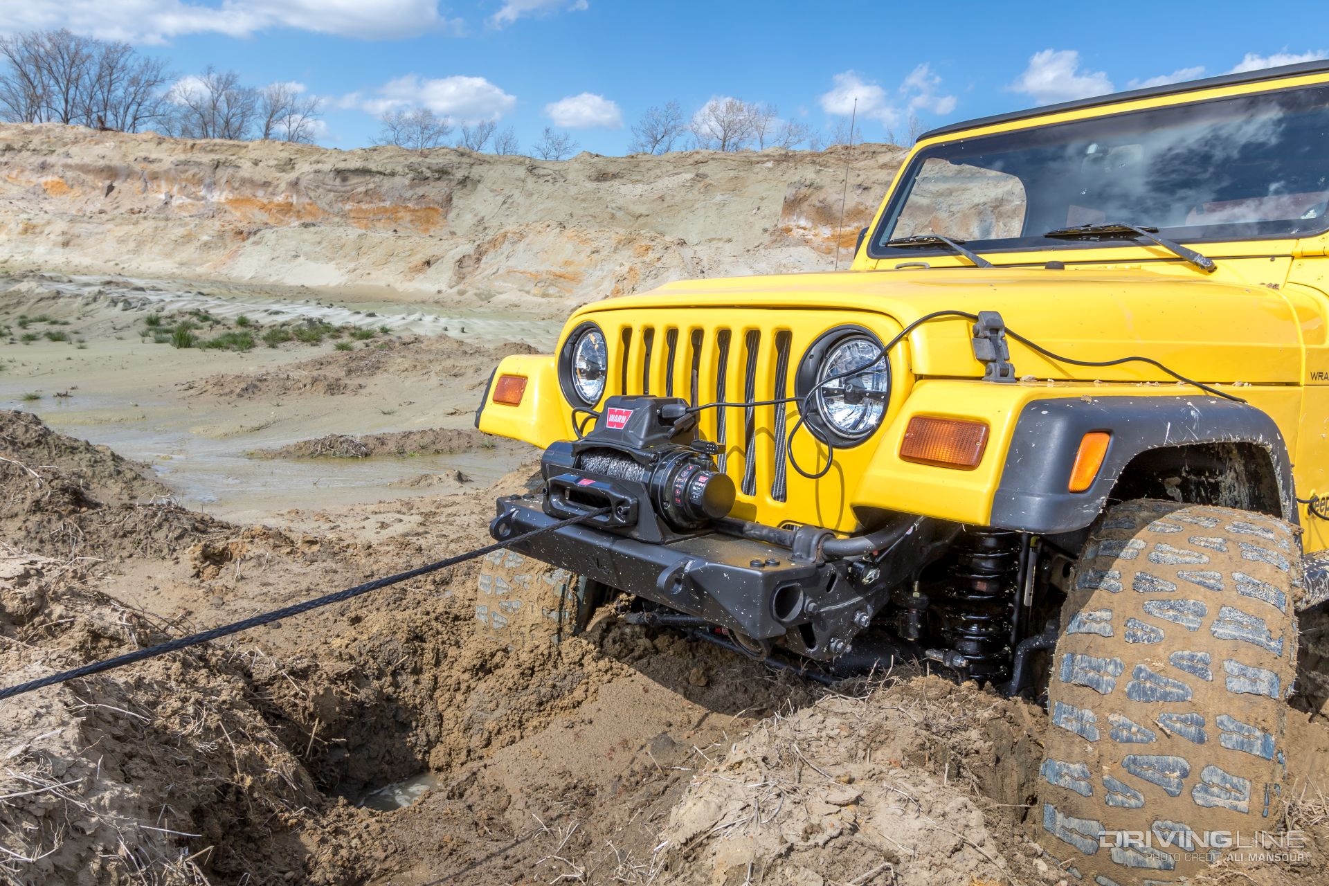 Jeep-wrangler-tj-evo-mfg-bumpers-warn-vr8-s-winch-mud-grapplers