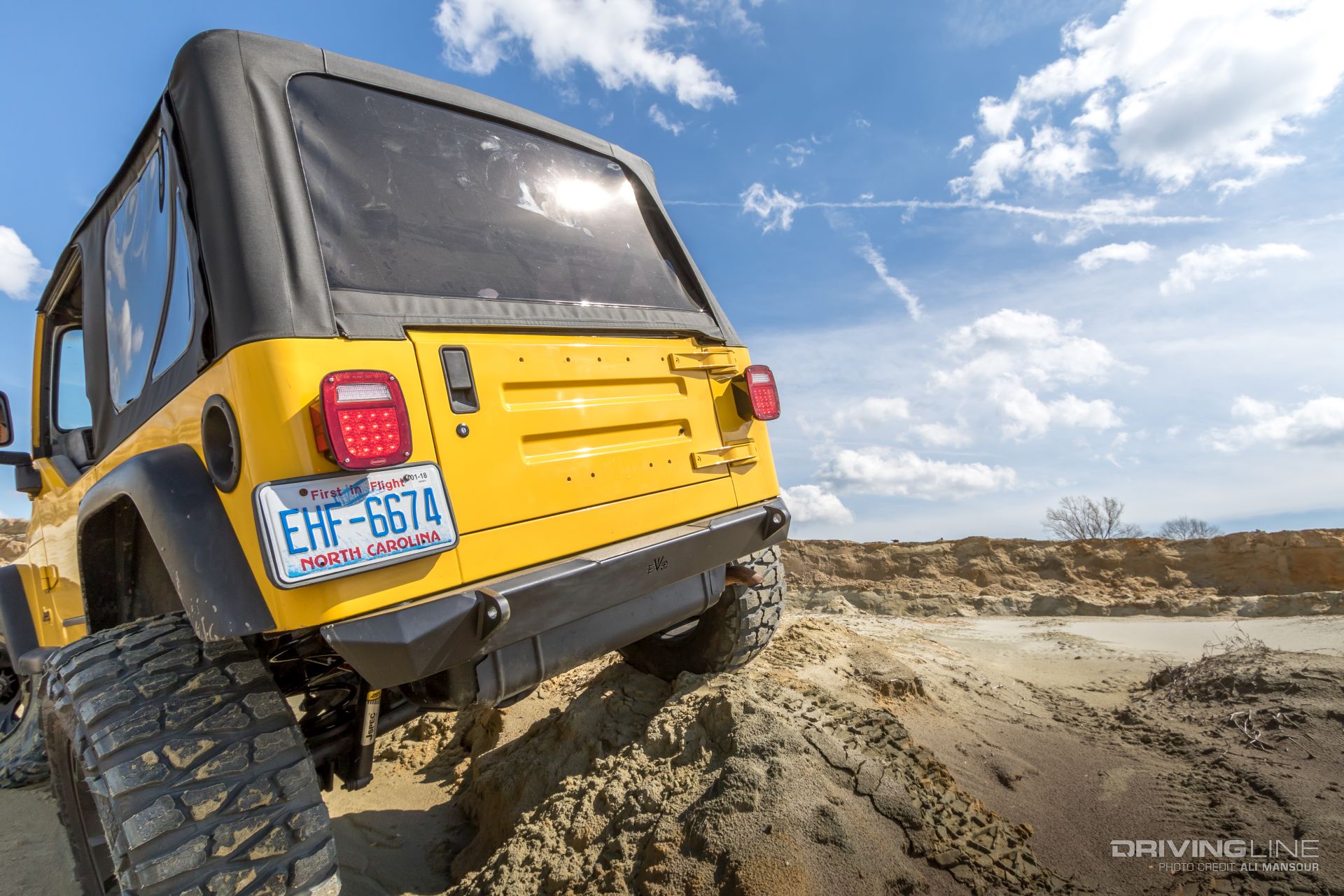 Jeep-wrangler-tj-evo-mfg-bumpers-warn-vr8-s-winch-mud-grapplers