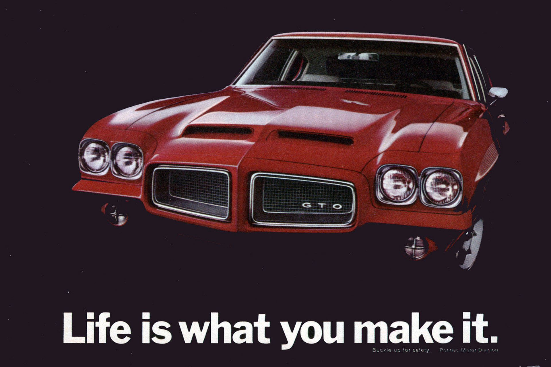 Red 1972 Pontiac GTO with the line, "Life is what you make it."