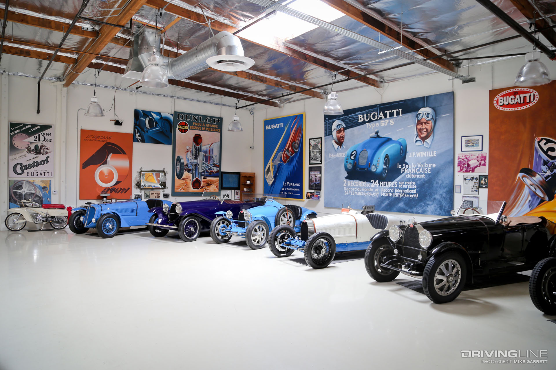 Old, open wheel cars in Jay Leno's garage