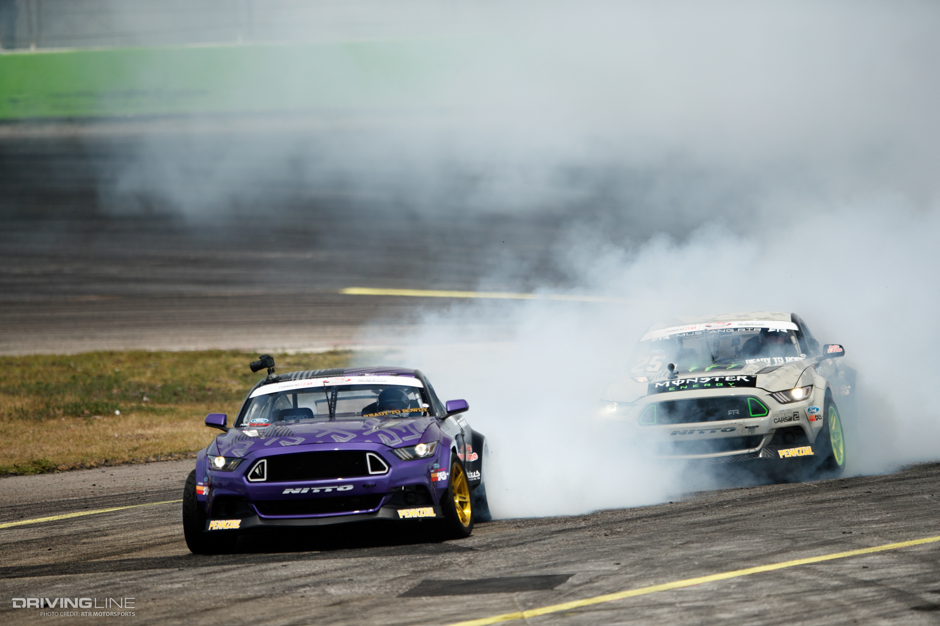 Chelsea DeNofa leading tandem drift with Vaughn Gittin Jr.