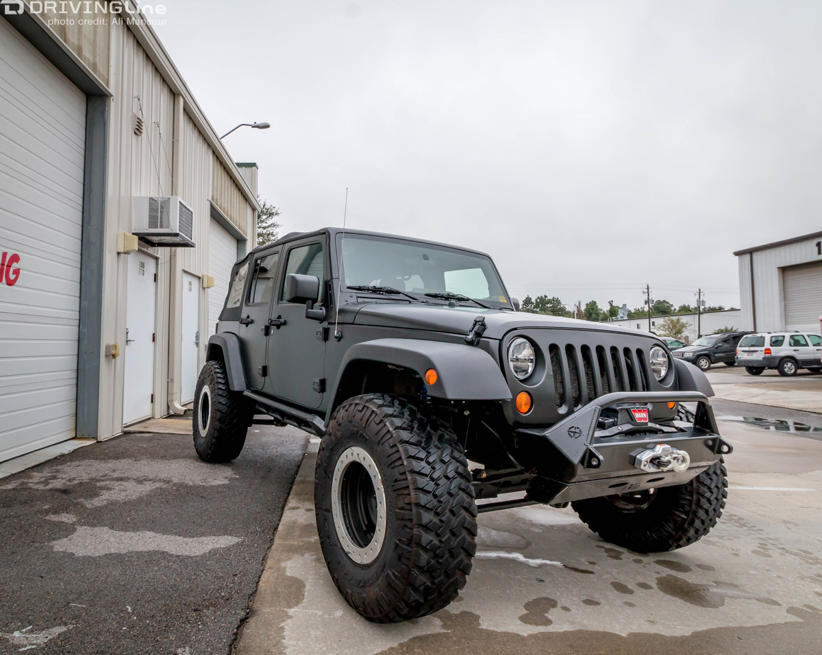 Front of a Jeep Wrangler JK with a 3M 1080 Satin Black vehicle wrap installed
