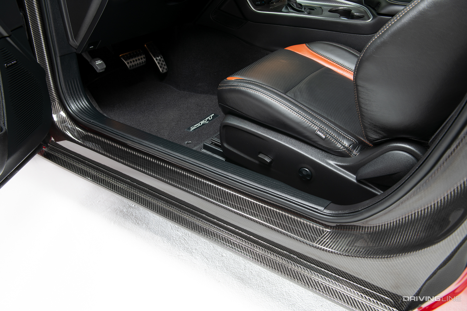 carbon fiber detail on door jambs of ExoMod D69 Daytona