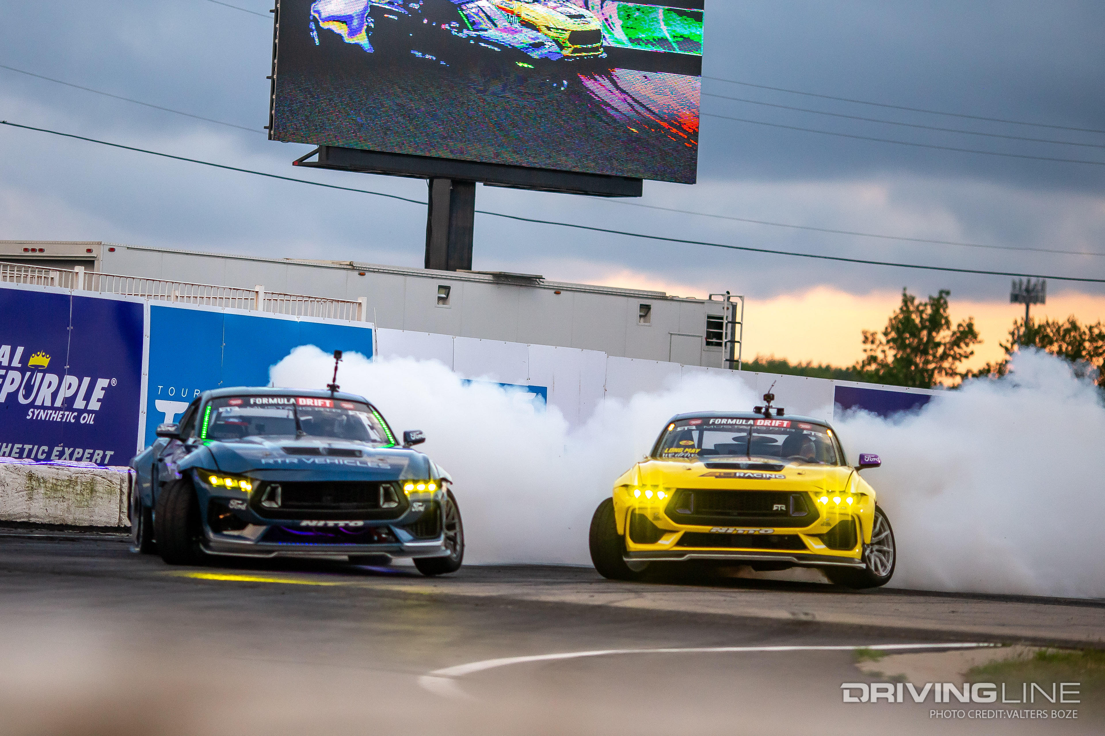 Adam LZ tandem Drifting against fellow RTR driver Chelsea DeNofa at 2023 Formula Drift New Jersey Englishtown Raceway