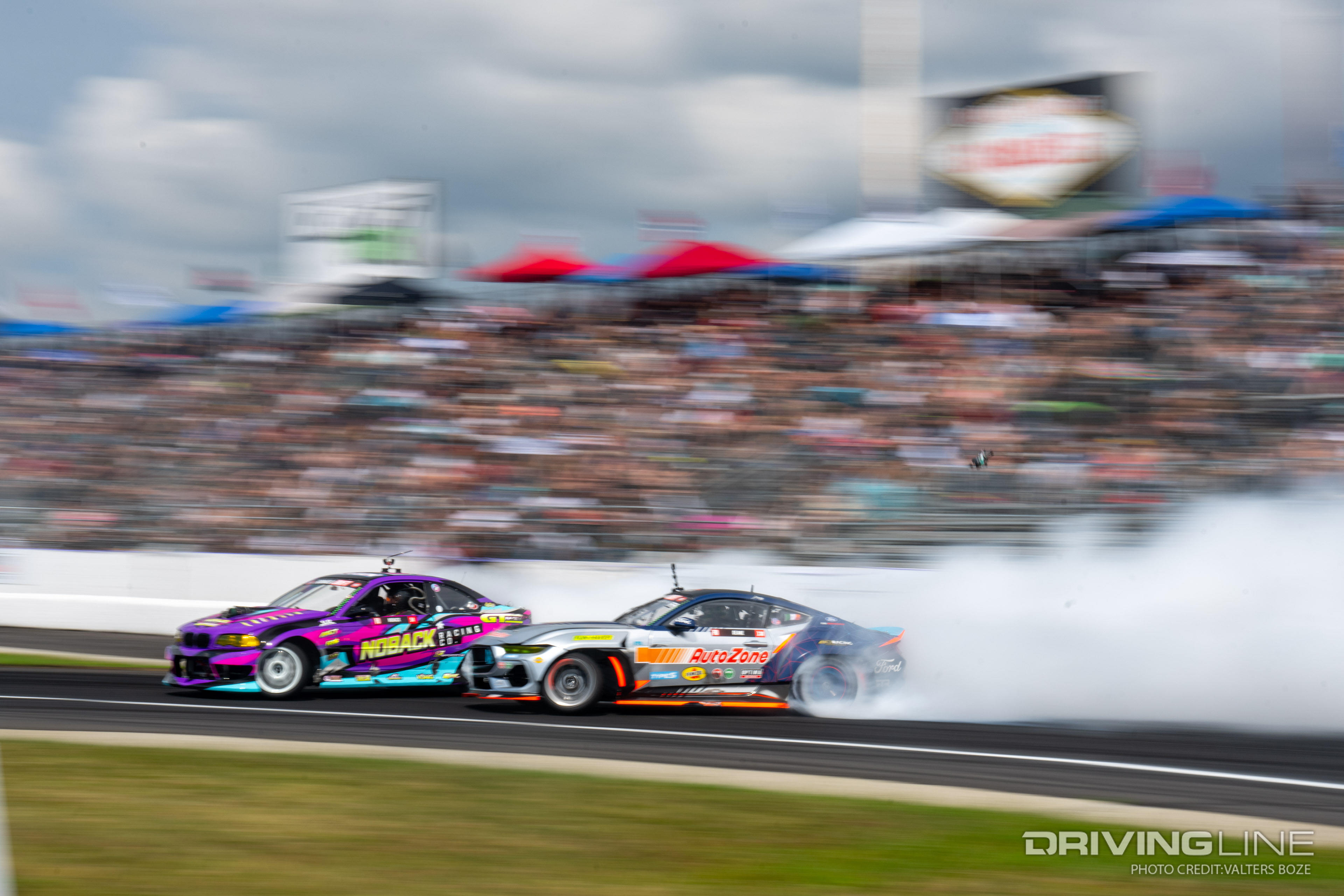 Nick Noback tandem drifting against James Deane at 2023 Formula Drift New Jersey Englishtown Raceway