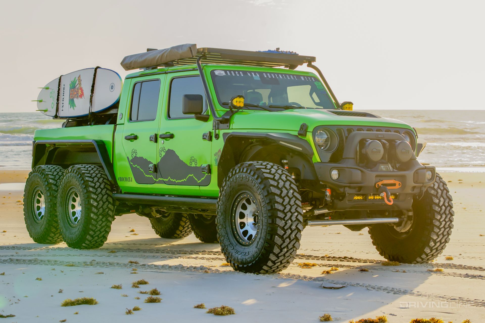 Jeep Gladiator Rubicon 6x6 on beach sunrise 3/4 front view