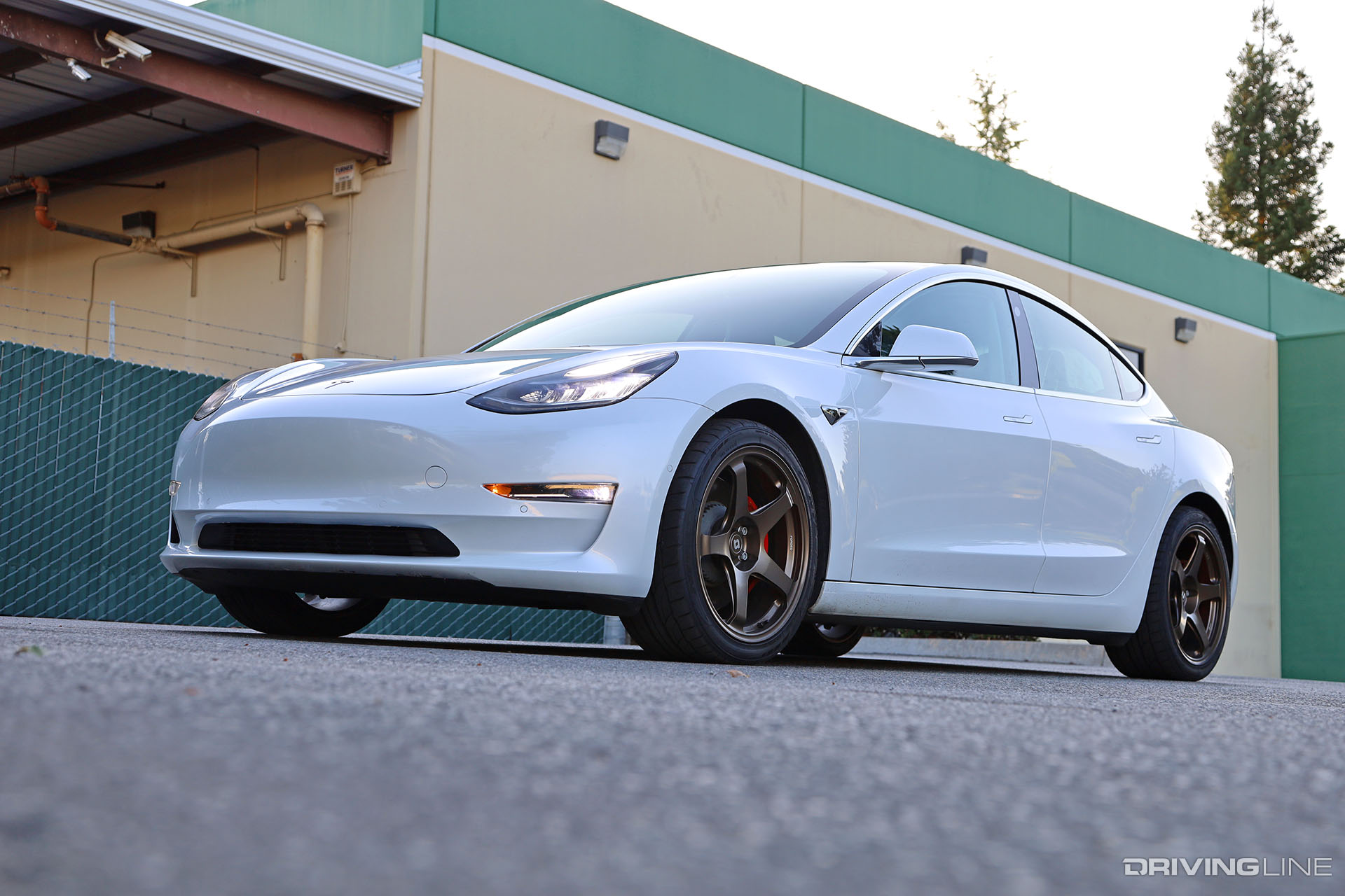 White Tesla Model 3 Performance on Nitto NT555 G2 tires and Titan 7 wheels
