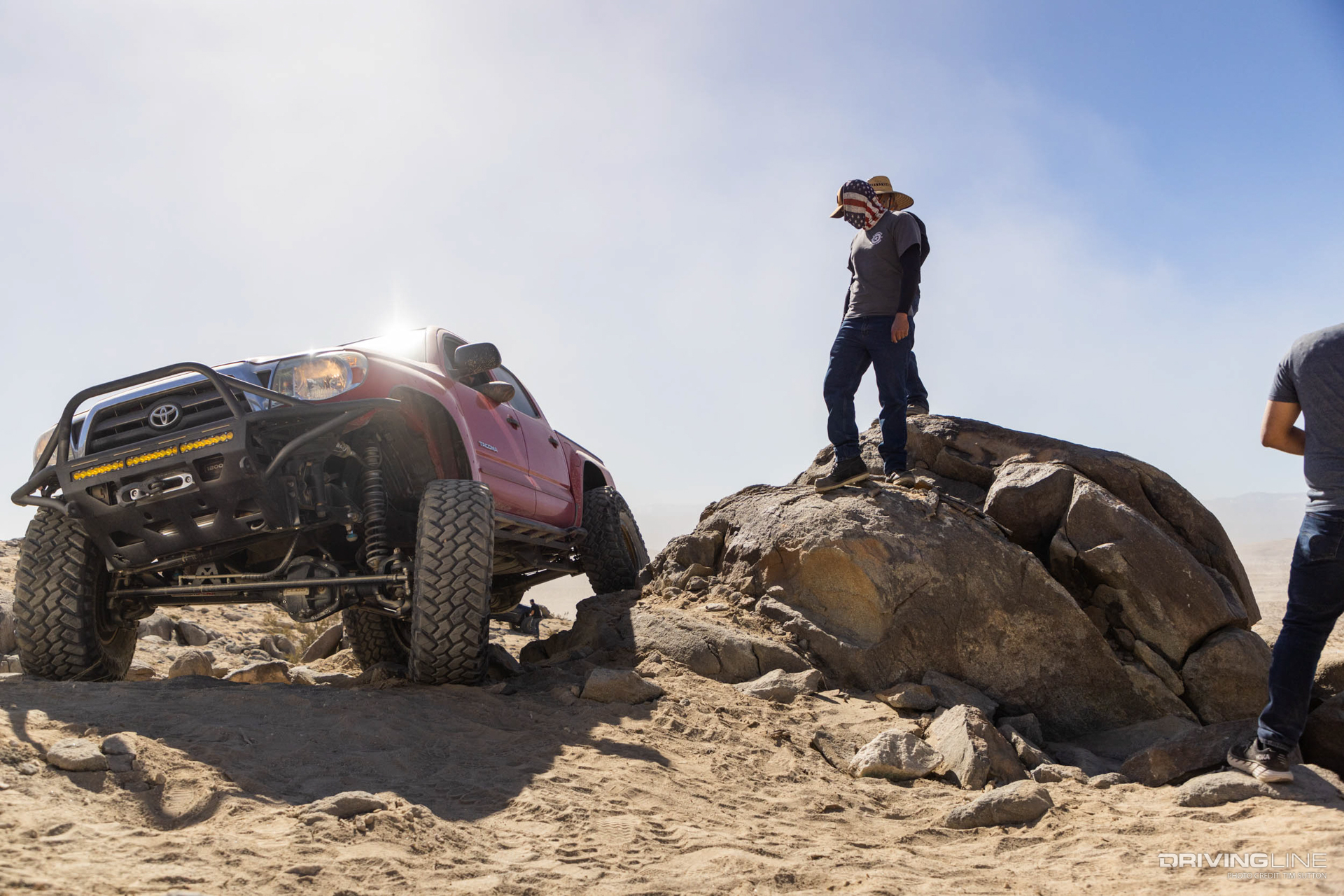 Spotting a red toyota tacoma off-road in johnson valley
