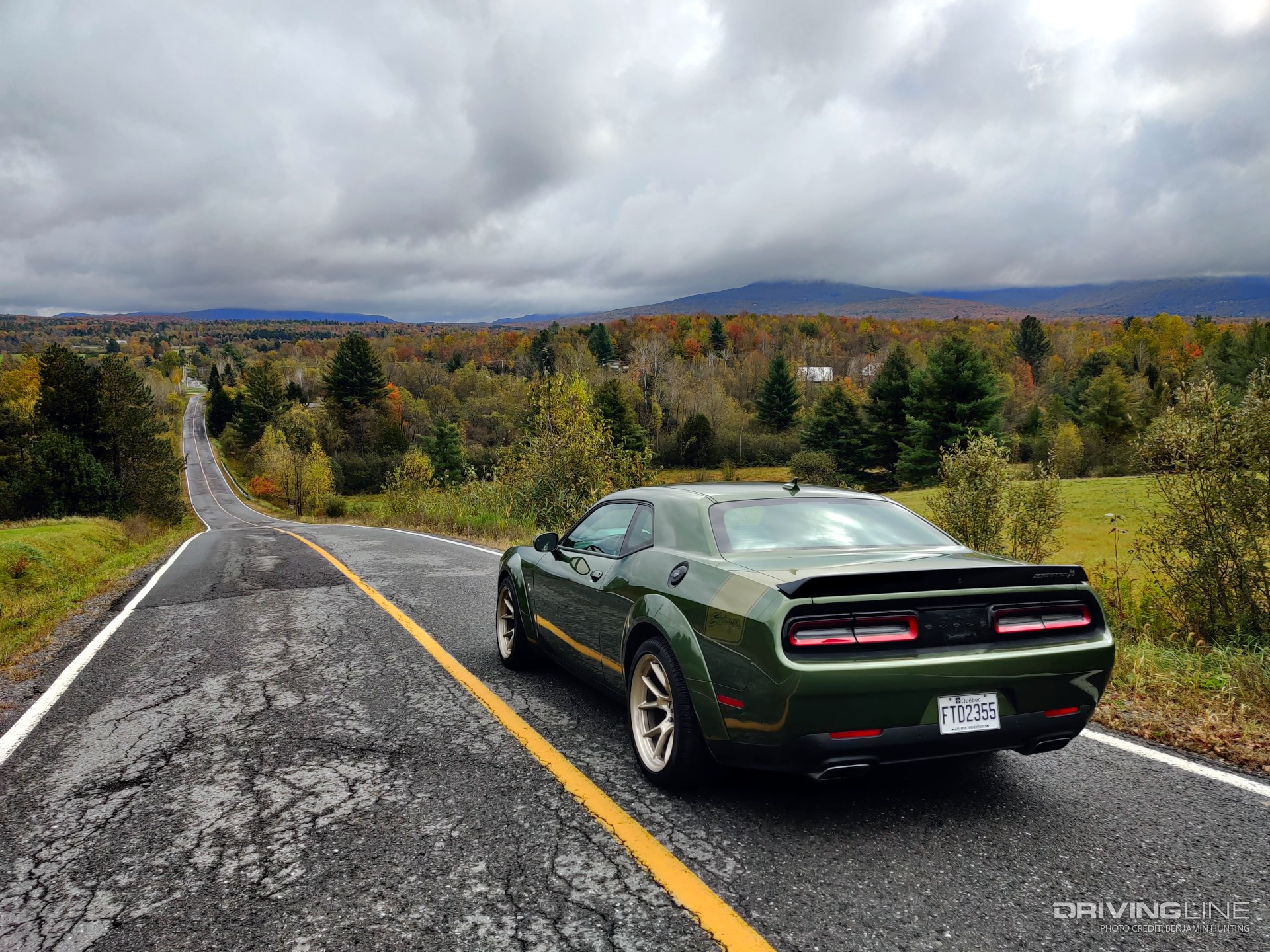 2023 Dodge Challenger R/T Scat Pack Swinger Last Call looking down a mountain road from behind