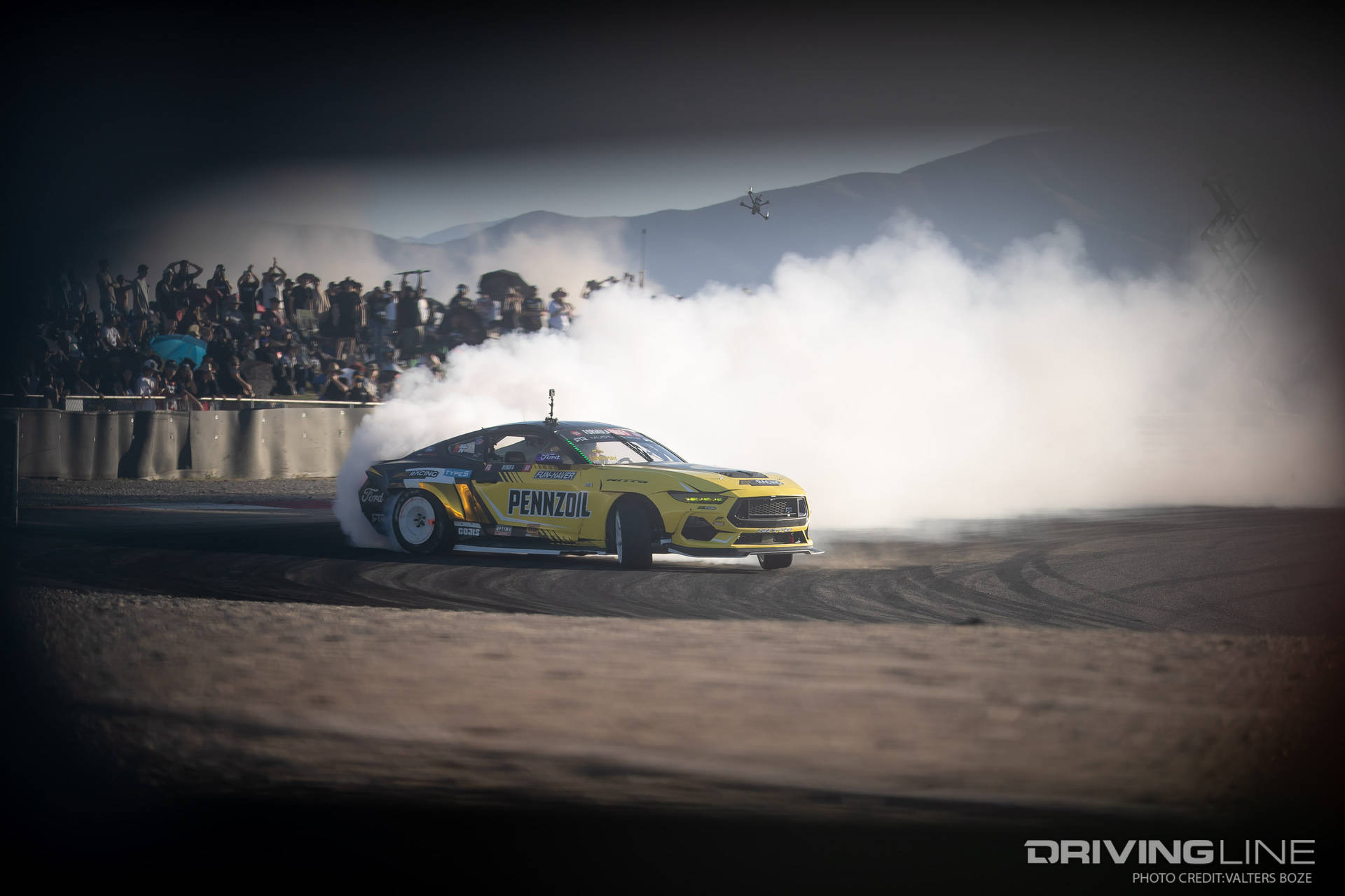 Chelsea DeNofa drifting in his RTR Mustang on Nitto NT555 G2 tires at 2023 Formula Drift Utah