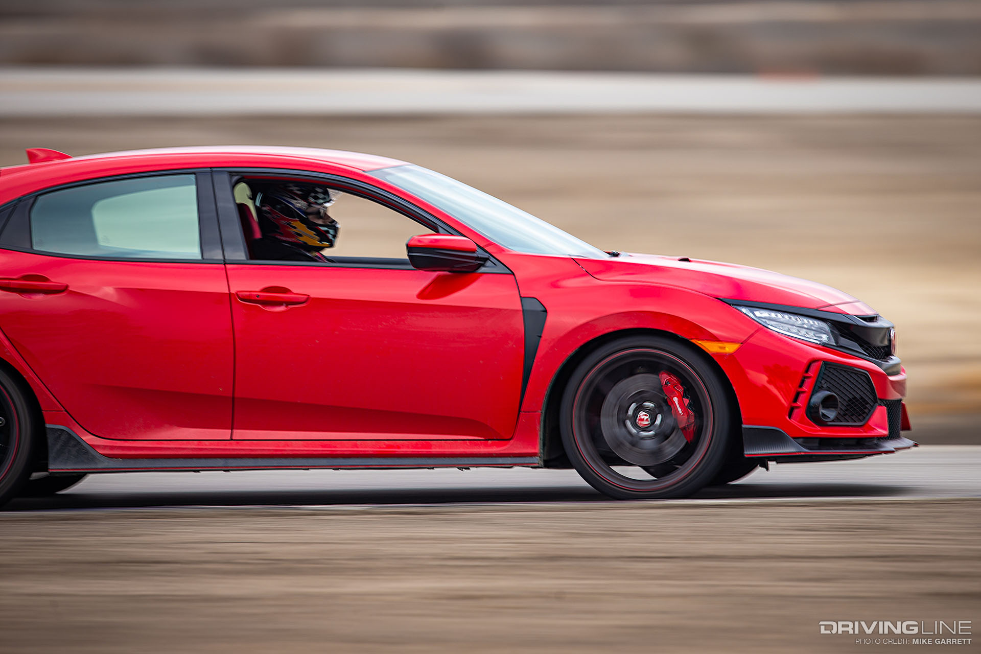 Honda Civic Type R on track in red at speed