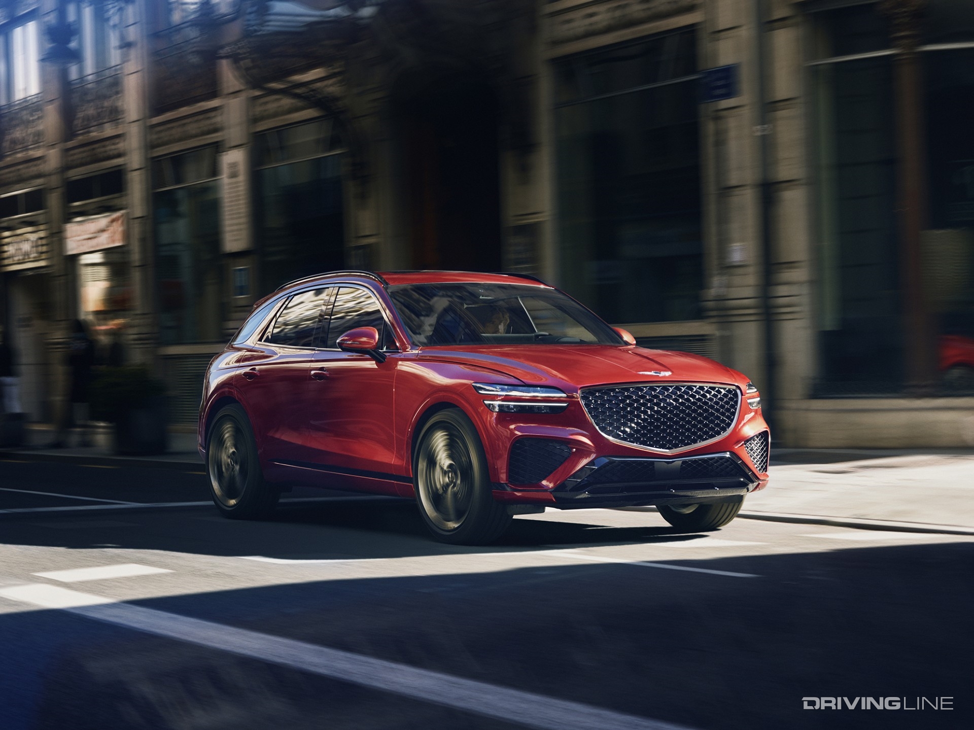 2023 Genesis GV70 on the road in red