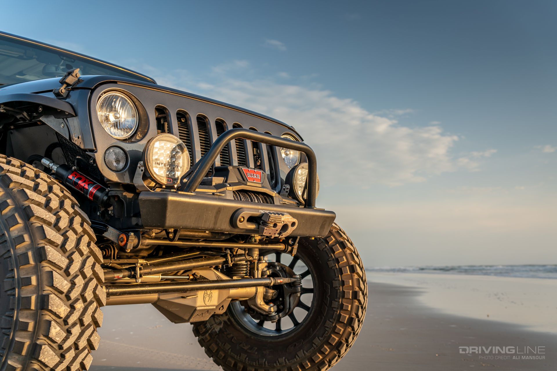 Savvy JK front bumper with ARB lights and Warn winch front 3/4 view