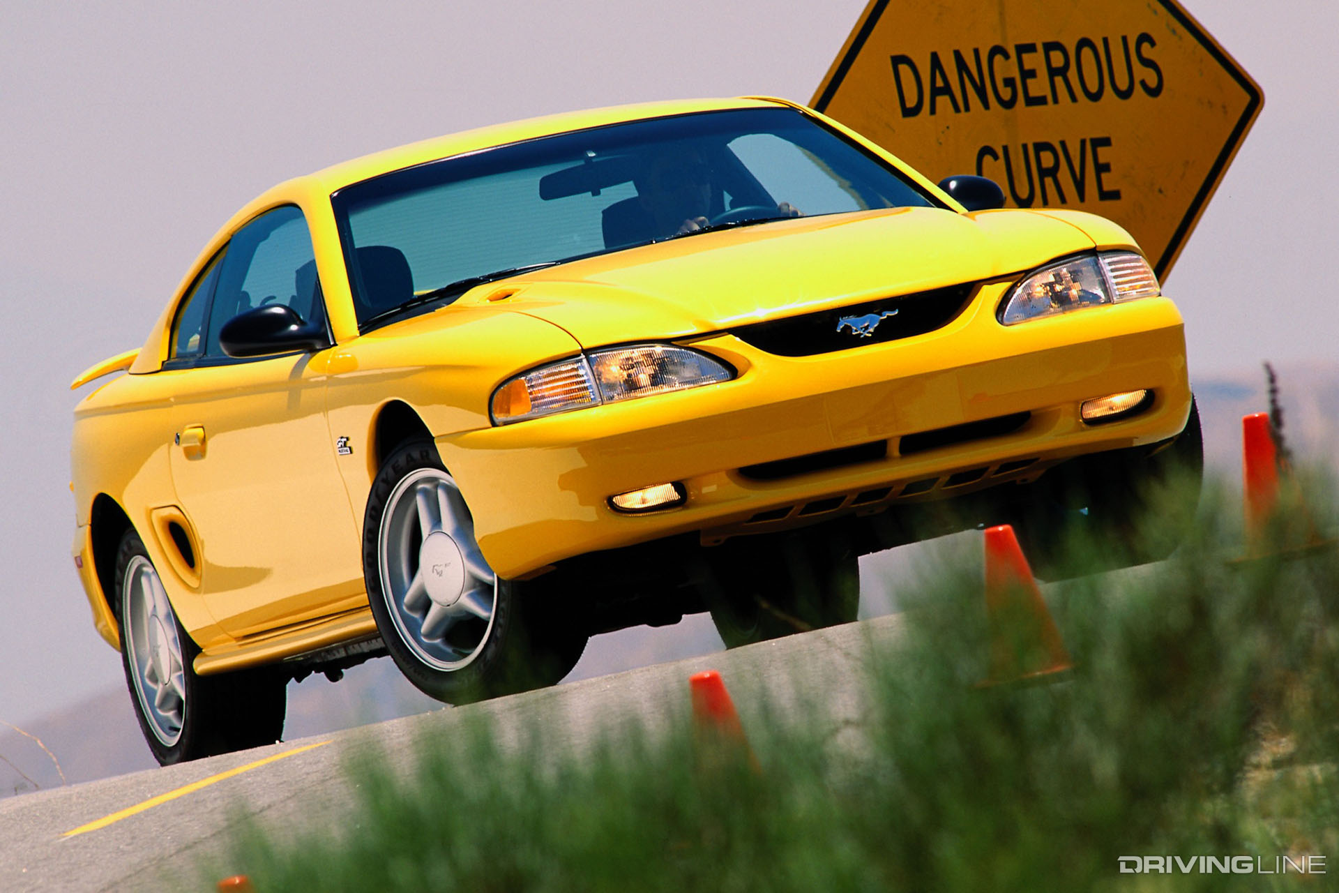 SN95 Ford Mustang GT with a 5.0 in yellow