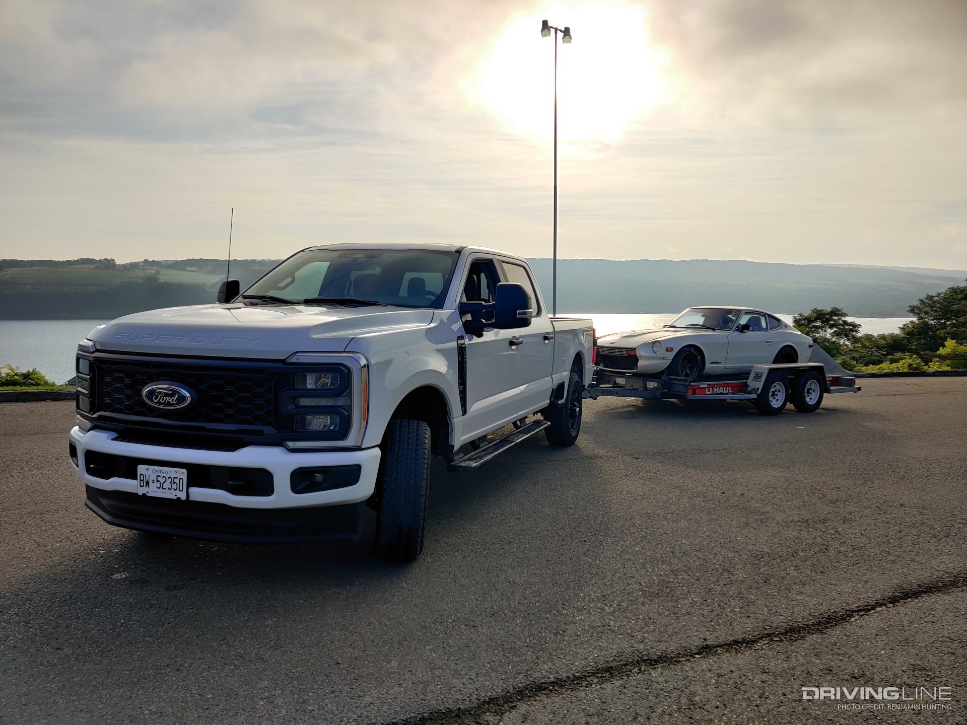 2023 Ford F-250 XL towing at dawn