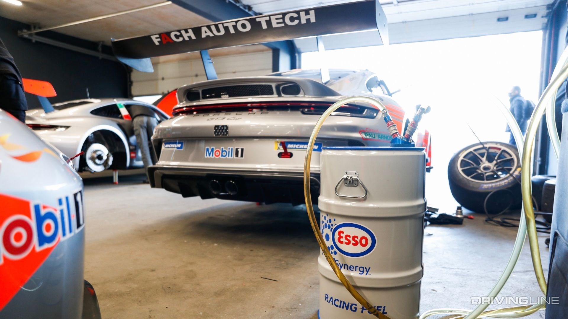Porsche e-fuel in racing garage bay